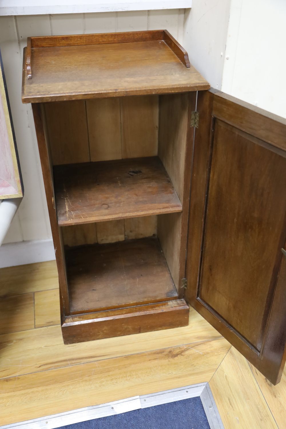 A late Victorian Aesthetic movement walnut bedside cabinet, width 39cm depth 36cm height 76cm